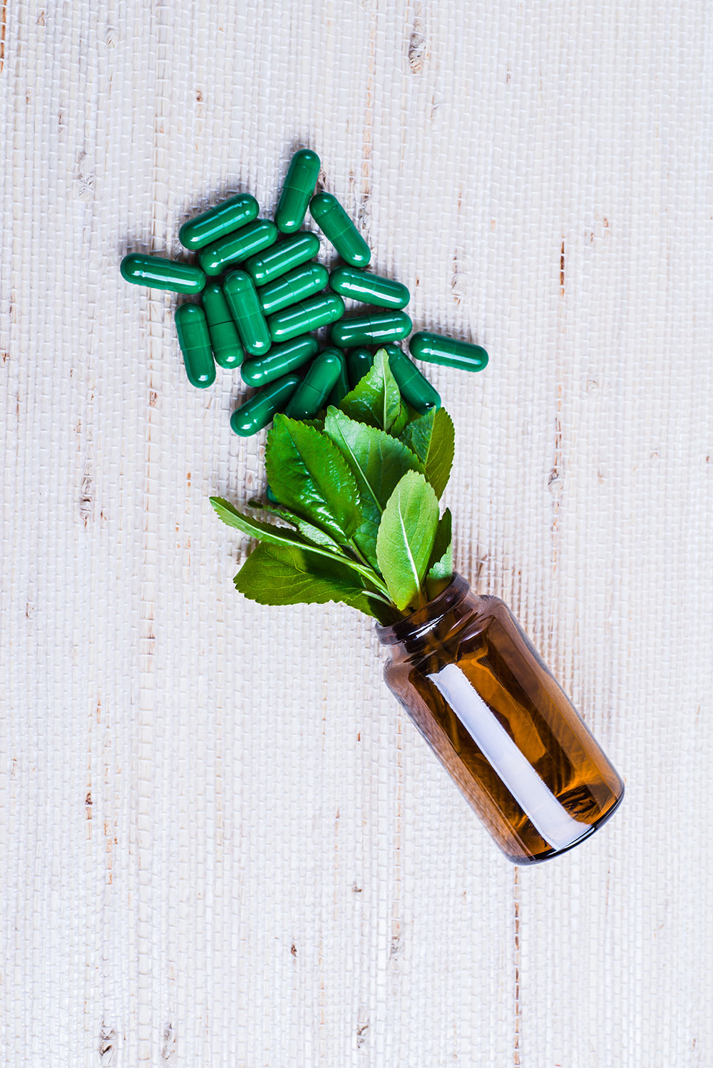Pill bottles with leaves